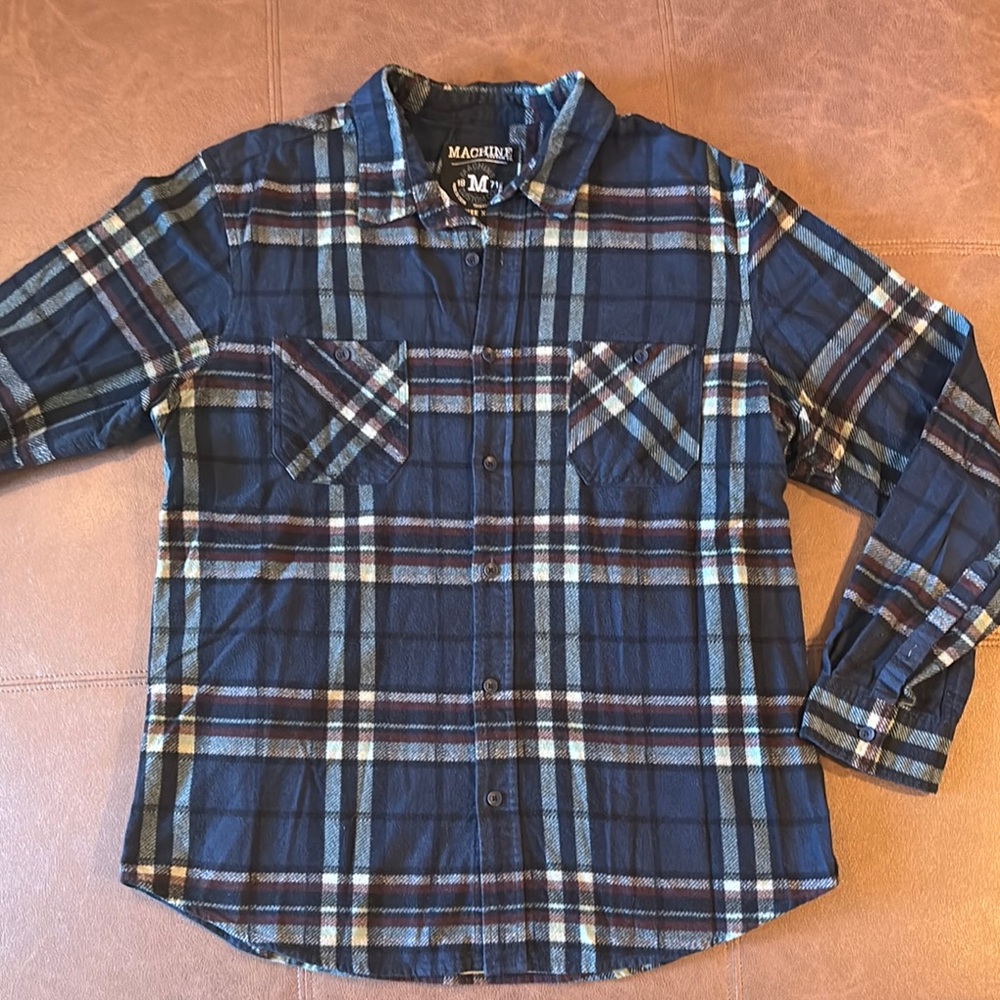 Machine dark blue mid-weight flannel.